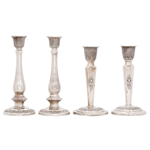 358 - Two pairs of Siamese silver candlesticks, first half 20th c, 20cm and 23cm h, one stamped STERLING t... 