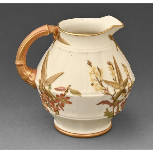 371 - A Royal Worcester bamboo from jug, 1887, moulded in relief and decorated in enamels with foliage, 11... 