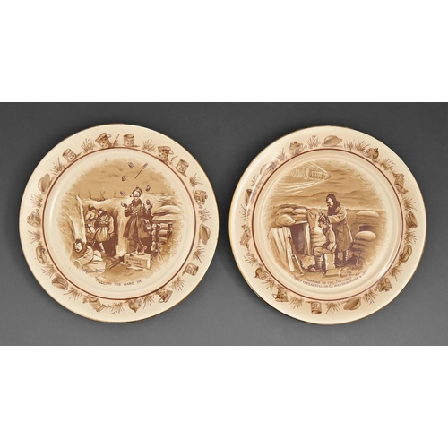 378 - World War I.  A pair of Grimwade's Bairnsfather ware Old Bill sepia printed plaques,   24.5cm diam, ... 