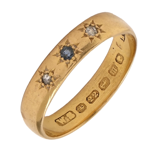 40 - A 22ct gold wedding ring, gypsy set with sapphire and diamond, Birmingham 1886, 4.3g, size P... 