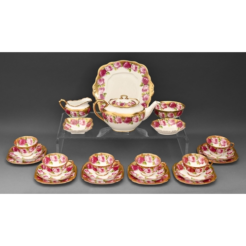 401 - A Royal Albert bone china tea service decorated with roses, teapot and cover 13cm h printed mark (24... 