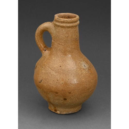 407 - A German brown saltglazed stoneware bottle or jug, possibly Cologne, 16th/17th c, loop handle, ... 