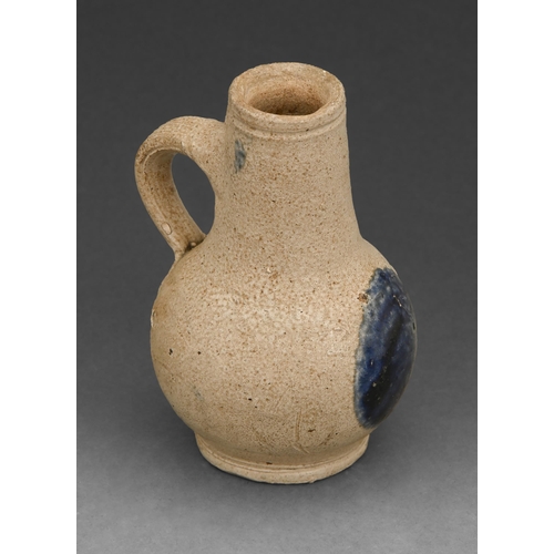 408 - A German stoneware baluster bottle or jug, Westerwald, 17th c, loop handle, circular foot, 10.5... 