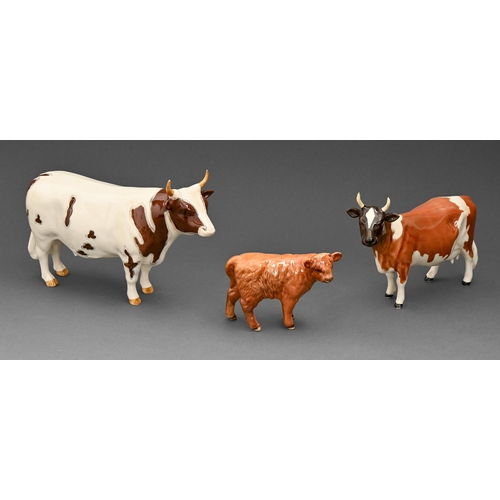 426 - Three Beswick earthenware cattle,  comprising bull, cow and calf, various