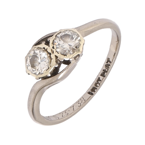 43 - A diamond crossover ring, with old cut diamonds, white gold hoop marked 18ct PLAT, 2.9g, size L... 