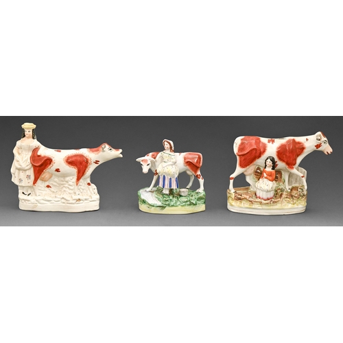 449 - Three Staffordshire earthenware cow and milkmaid groups, late 19th c, 18cm h and smaller... 