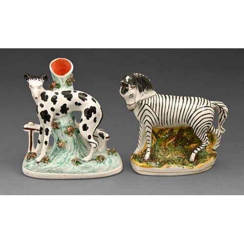 456 - A Staffordshire earthenware spill holder model of a 'Disraeli' spaniel and a contemporary model of a... 