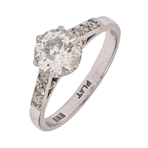 47 - A diamond ring, the round brilliant cut diamond flanked by triple diamond set shoulders, in platinum... 