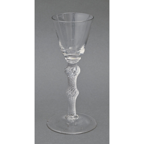 470 - A wine glass, c1760,  the round funnel bowl on bladed knop and double knopped multiple spiral air tw... 