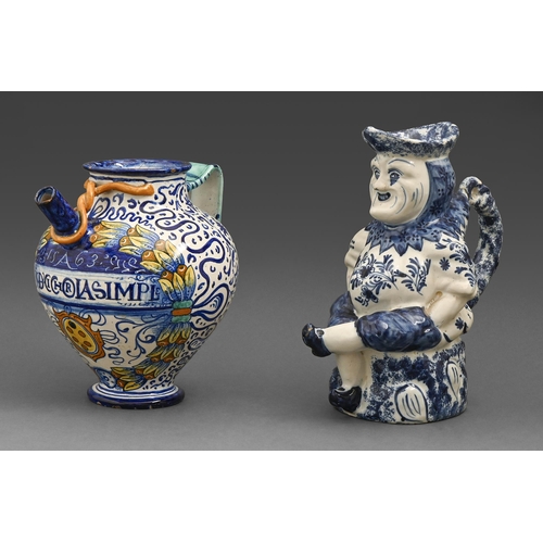 496 - A Dutch Delftware toby jug and a Cantagalli  miaolica wet drug jar, 19th/early 20th c and  later,  j... 