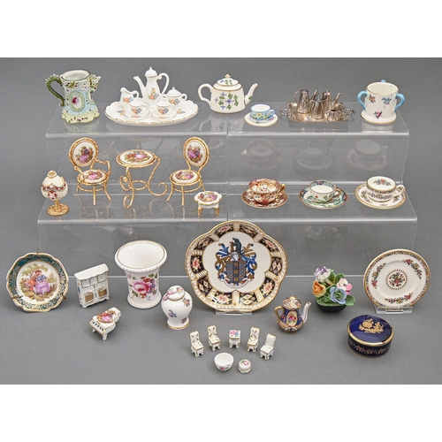 497 - A collection of miniature porcelain vases, teaware and furniture, including Minton, Crown Staffordsh... 