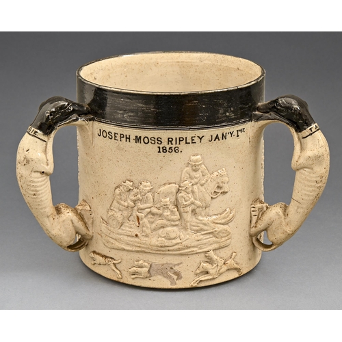 512 - A saltglazed brown stoneware loving cup, Derbyshire, mid 19th c, with typical sprigged decoration an... 