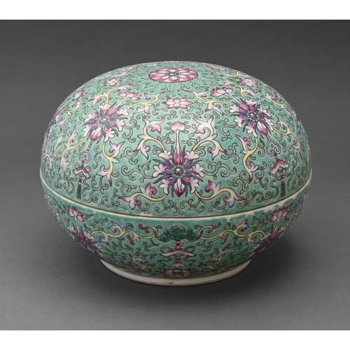 518 - A Chinese turquoise ground famille rose round box and cover, enamelled with stylised lotus and tendr... 