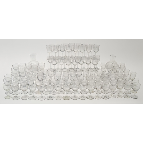 552 - An Edwardian suite of drinking glass, including two carafes, with etched Greek key pattern, and a sm... 