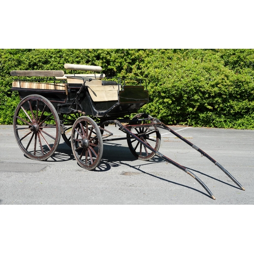 562 - Horse drawn vehicle. A four-wheeled open carriage, waggonette, Northern European c. late 19th c, the... 
