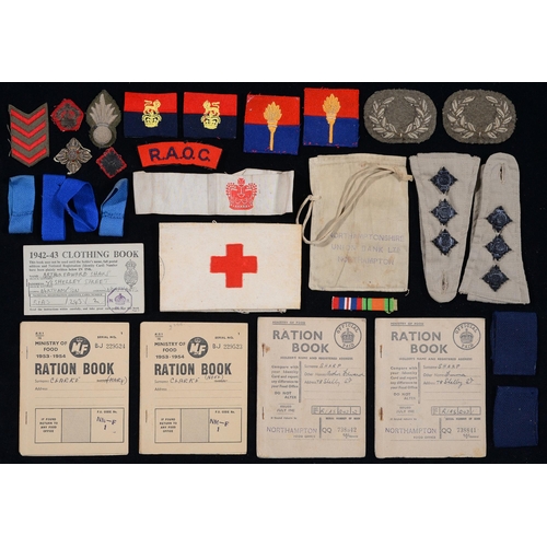 567 - British Militaria. Cloth insignia, including Army Medical Service armband, several WWII ration books... 