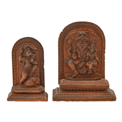 651 - Two Indian sandalwood devotional sculptures, late 19th-early 20th c, of the monkey god Hanuman and t... 