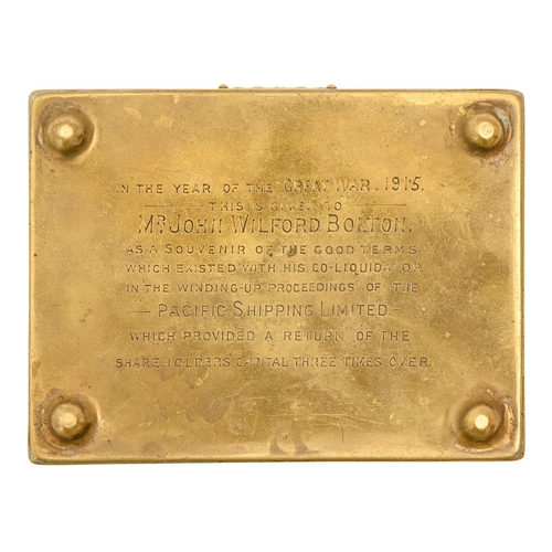 670 - An art nouveau stamped brass box, 1915, underside engraved with presentation inscription to John Wil... 