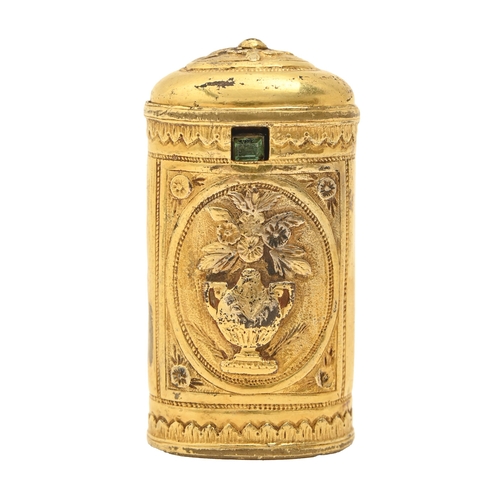 672 - A French copper gilt pillar shaped box, early 19th c, stamped and applied with an urn and paterae, 7... 