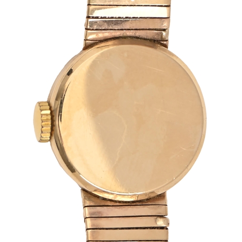 69 - A Tissot 9ct gold lady's wristwatch, 20mm diam, import marked London 1966, on bark textured tapering... 