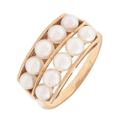 7 - A cultured pearl ring, in gold marked K18, 3.4g, size O