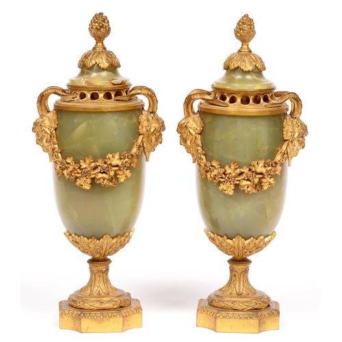 745 - A pair of French ormolu mounted onyx brule parfums, late 19th c, in Louis XVI style, with cisele sat... 