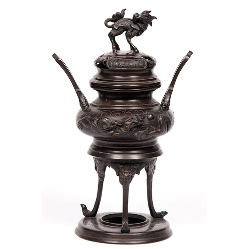 750 - A Chinese bronze two-handled tripod censer and cover, early 20th c, 39cm h