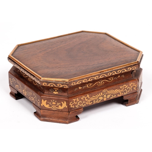 752 - A Chinese brass-inlaid hardwood octagonal stand, 5cm h