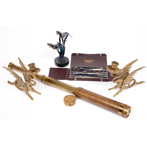 757 - A pair of brass candlesticks in the form of a phoenix, 17cm h, a brass refracting telescope, a cased... 