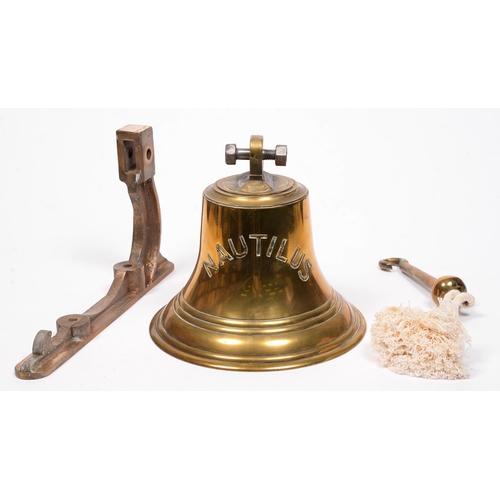 772 - Maritime interest. A brass ship's bell, inscribed NAUTILUS, first half 20th c, with clapper and oak ... 