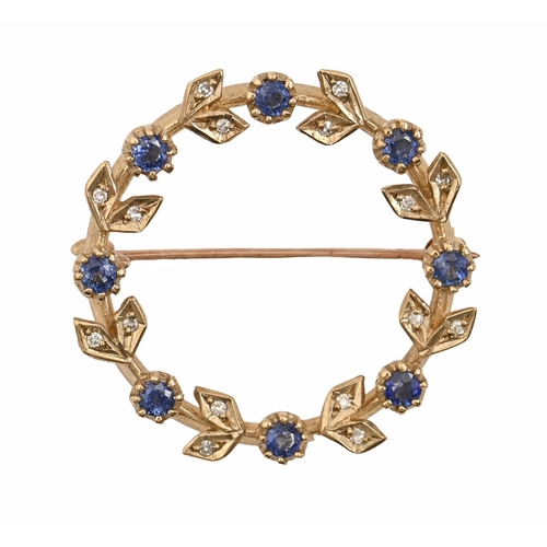 79 - A sapphire and diamond circlet brooch, in 9ct gold, 28mm diam, 4.5g