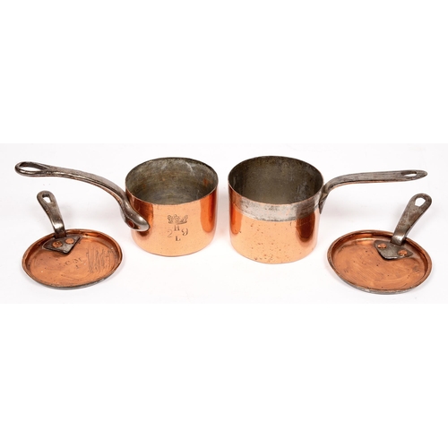 810 - A Victorian or Edwardian copper saucepan and lid, stamped coronet letters and numbers, 8cm h, and an... 