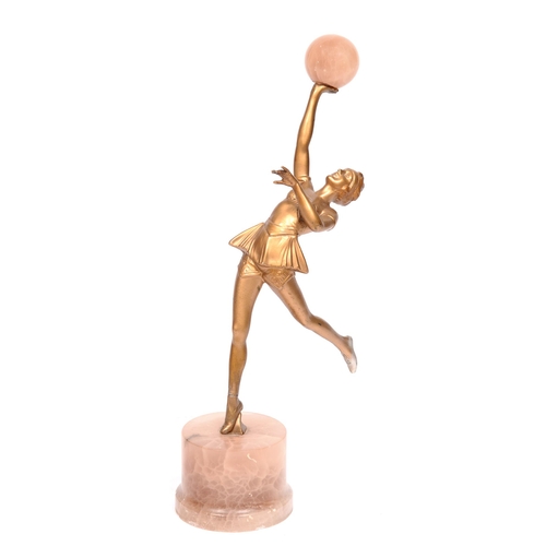 817 - An art deco gold painted spelter figure of a female dancer, c.1930, alabaster base, 31cm h... 