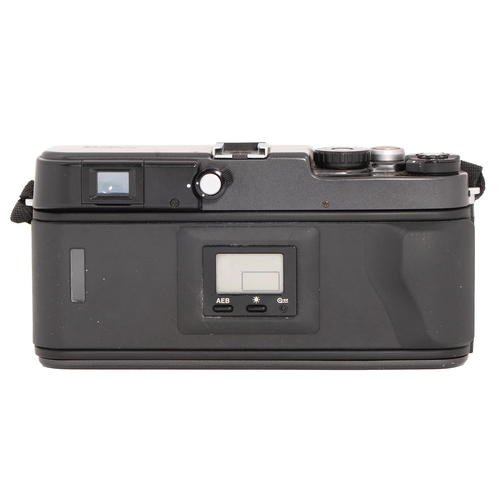 828 - A Hasselblad XPan 35mm panoramic camera, No 11EE18745, with maker's 45mm F4 lens No 8YEE17445, both ... 