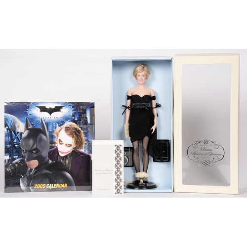 835 - A Franklin Mint 'Diana, Princess of Glamour' limited edition portrait doll, boxed and a DC Comics Ba... 