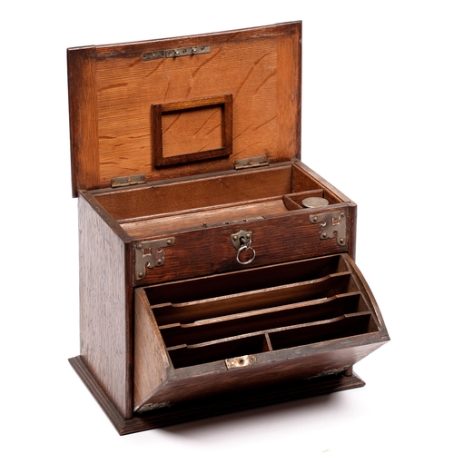 848 - A Victorian oak stationery box, with fitted interior, 23cm h