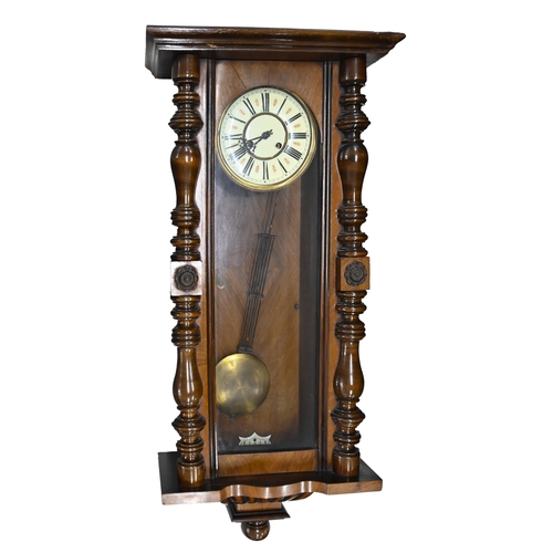 936 - A walnut Vienna wall clock, c.1900, with primrose enamel dial, pendulum, 102cm h