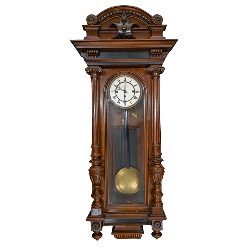 940 - A walnut Vienna wall clock, c.1900, with three train movement, pendulum and weights, 125cm h... 