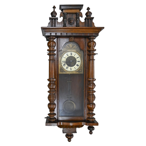 941 - A walnut Vienna wall clock, c.1900, pendulum, 120cm h