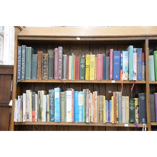 990 - Books. Nine shelves of general stock, late 19th c and later, including Bibles, theology, devotionals... 