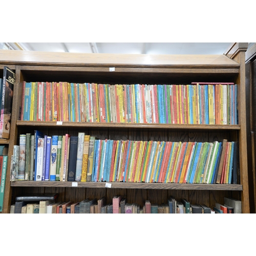 992 - Books. Six shelves of general stock, early 20th c and later, including vintage children's Ladybird B... 