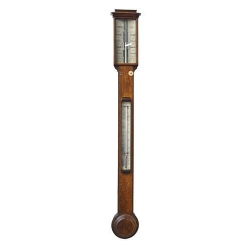 920 - A Victorian oak cistern barometer, Davis, Leeds, c1870, the ivory register with twin verniers for 10... 