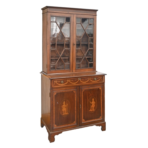 1239 - An Edwardian mahogany, satinwood and inlaid bookcase, the panelled doors to the lower part decorated... 