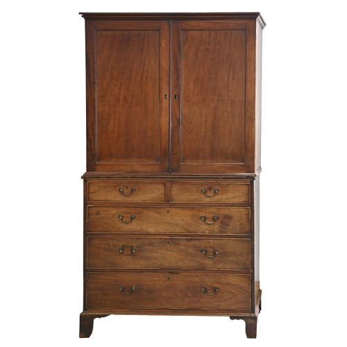 1250 - A Victorian mahogany linen press, the associated upper part fitted with two adjustable sliding trays... 