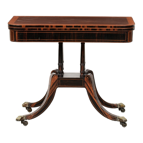 1276 - A George IV zebrawood card table,  crossbanded in satinwood, on ring turned pillars, block and four ... 