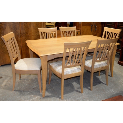 1291 - A modern oak extending dining table, 76cm h; 90 x 202cm, a set of six chairs and a similar low side ... 