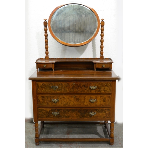 1317 - A walnut and mahogany mirror backed dressing table, on stretcher base, 62cm h; 92 x 51cm... 