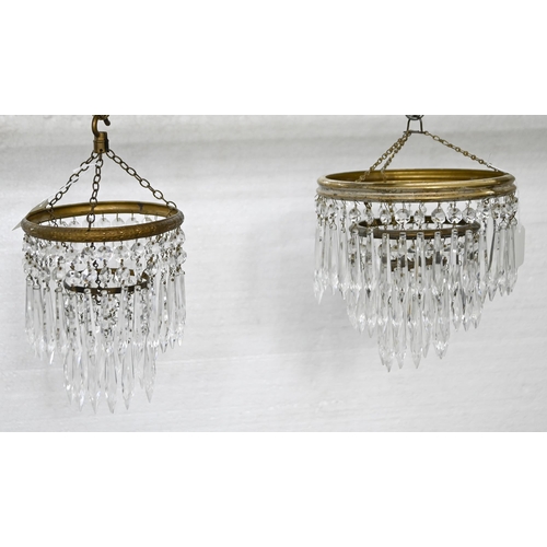 1125A - Two graduated corridor chandeliers, the brass circle and prismatic cut glass beads and pendants, 20c... 