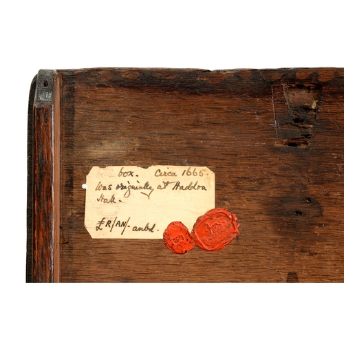 1158 - A Charles II joined oak box stool, with channelled rails and iron lock plate, on turned legs with st... 