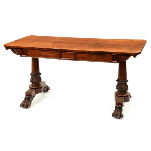 1182 - A Victorian rosewood library table, fitted with two drawers and opposing blind drawers, on four feet... 